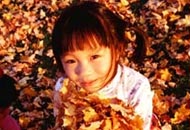 Image of girl and leaves